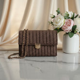Brown woven handbag