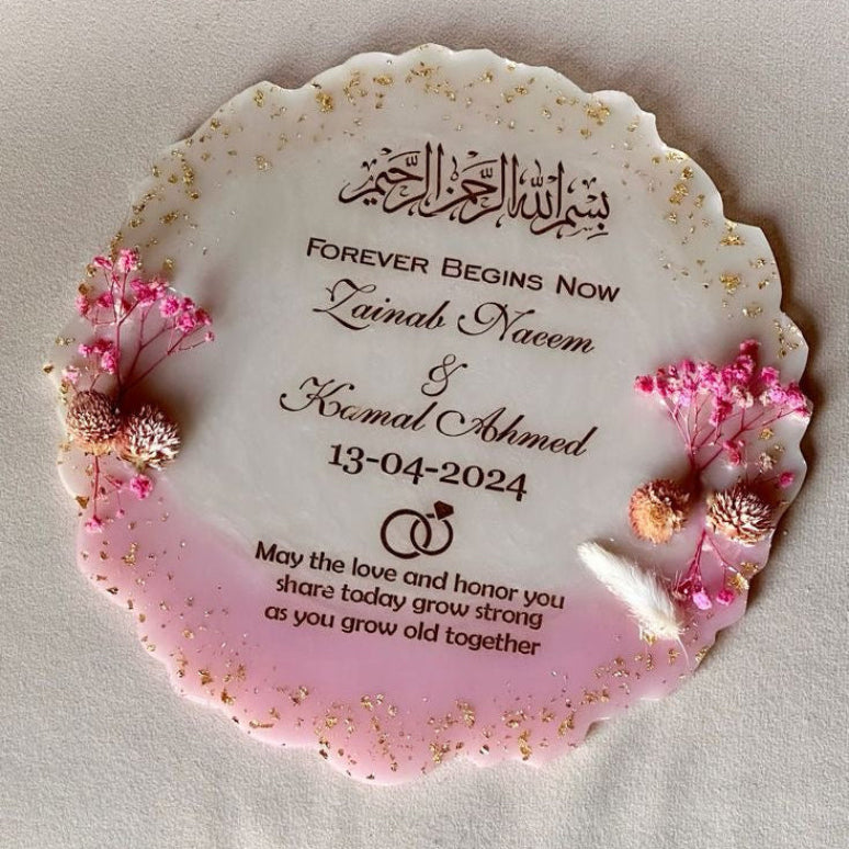 Personalized wedding plaque with floral design and text on a light background