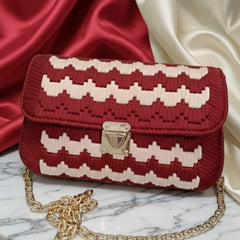 Red and white patterned handbag with gold chain