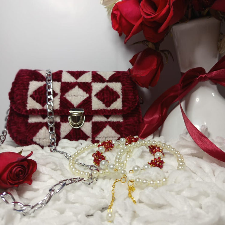 Red and white patterned handbag with pearls 