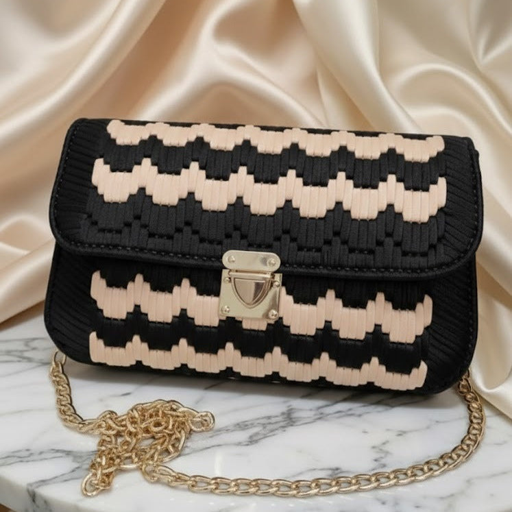 Black and beige handbag with gold chain 