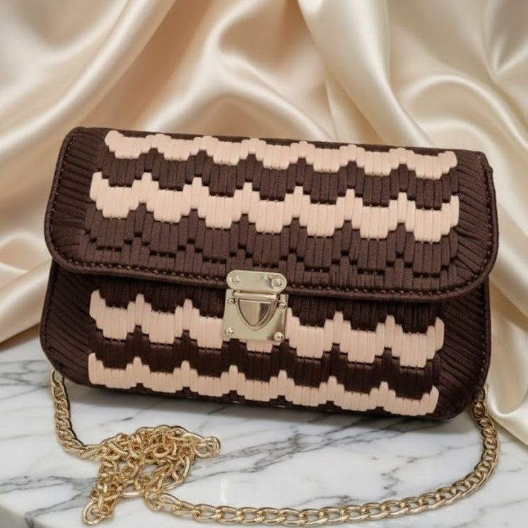 Brown and beige patterned handbag with gold chain 