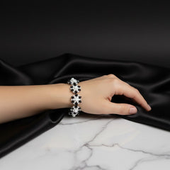 Hand wearing a bracelet 