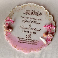 Personalized wedding plaque with floral design and text on a light background